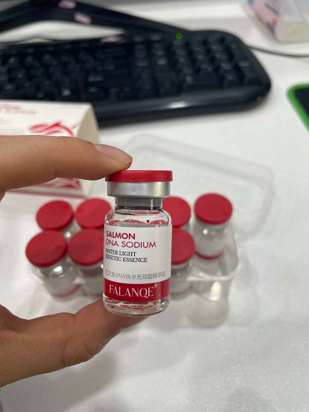 FALANQE Salmon DNA Sodium Water Light Kinetic Essence – set of glass vials with red caps and box packaging, lifts and tightens skin, anti-wrinkle and wrinkle smoothing